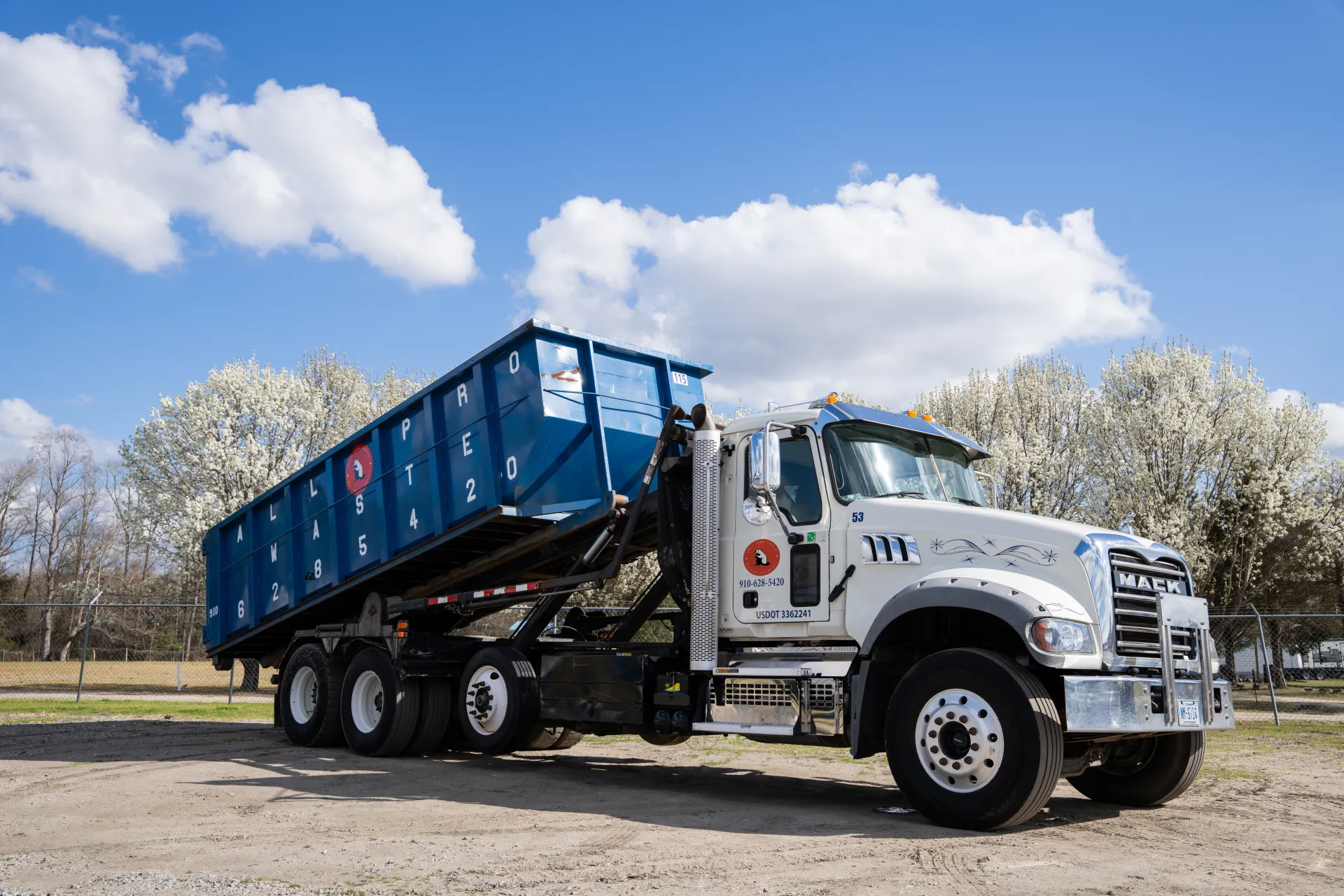 All Pro Waste roll-off dumpster on a construction site in Lumberton, NC